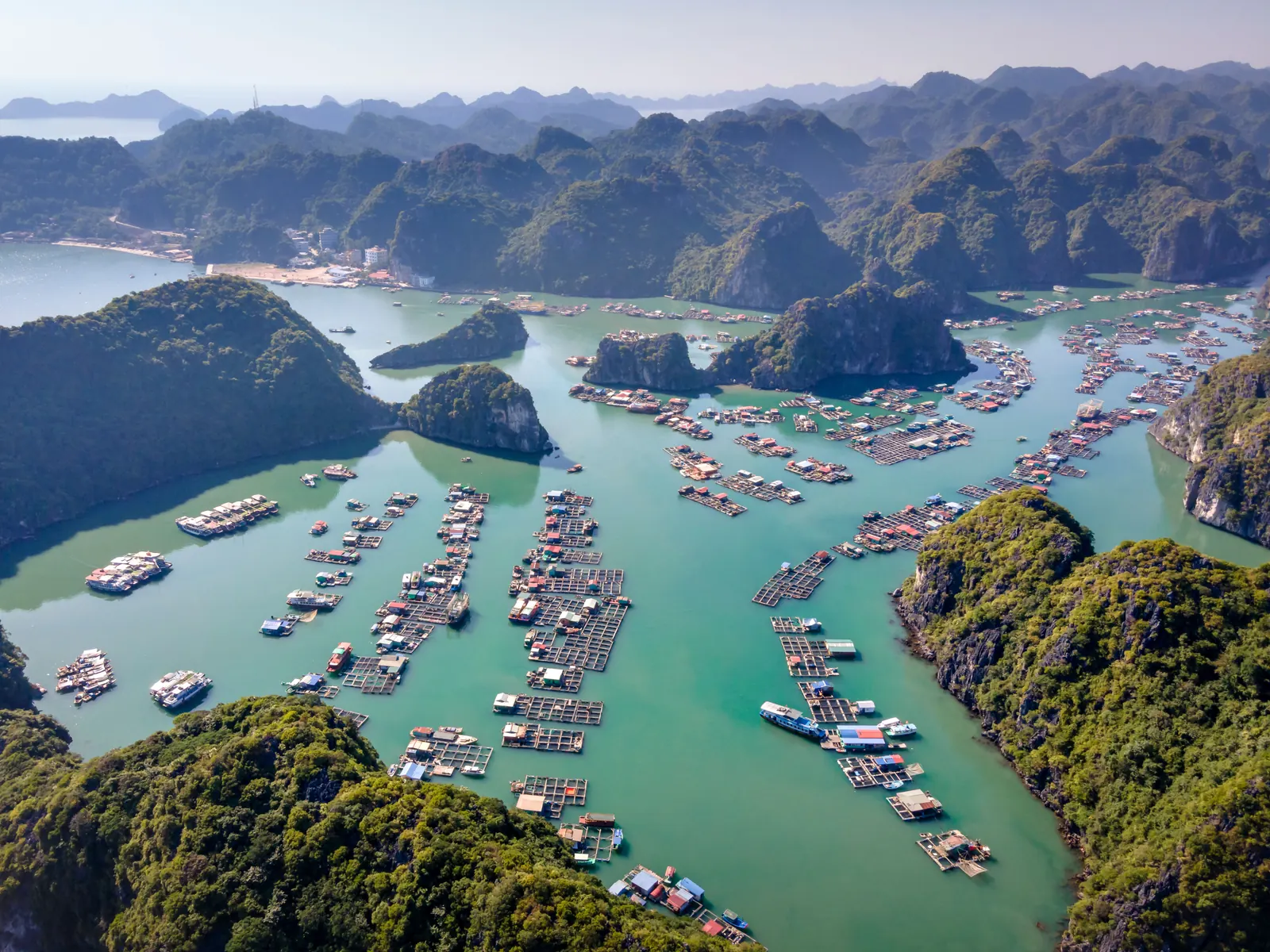 Limestone islands and floating fishing farms